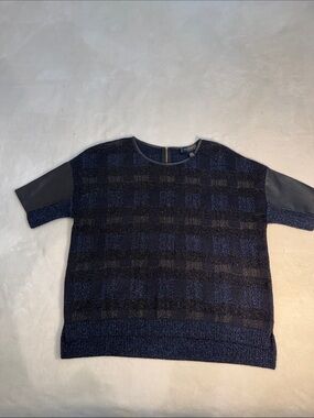 St. John black/gold/blue plaid knit top with leather arm and neck detail. M.